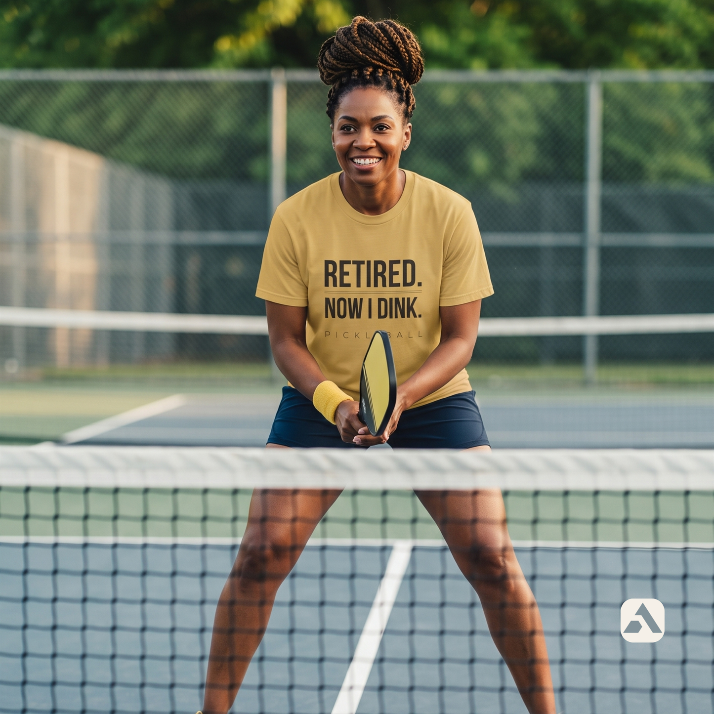 Retired. Now I Dink. pickleball t-shirt, Mustard — player at the kitchen line